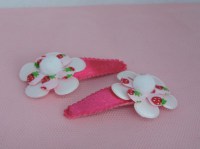 fucsia roze haarspeld met bloem en pompon